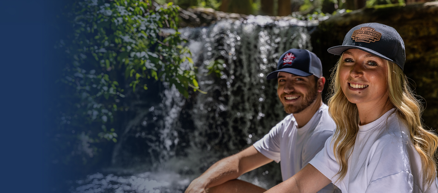 Two people wearing Classic Cap USA hats