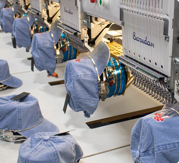 Embroidery machines stitching caps
